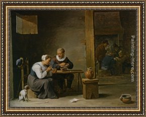 A Peasant Family Gathered Around The Kitchen Table Framed Paintings - A man and woman smoking a pipe seated in an interior with peasants playing cards on a table by David the Younger Teniers